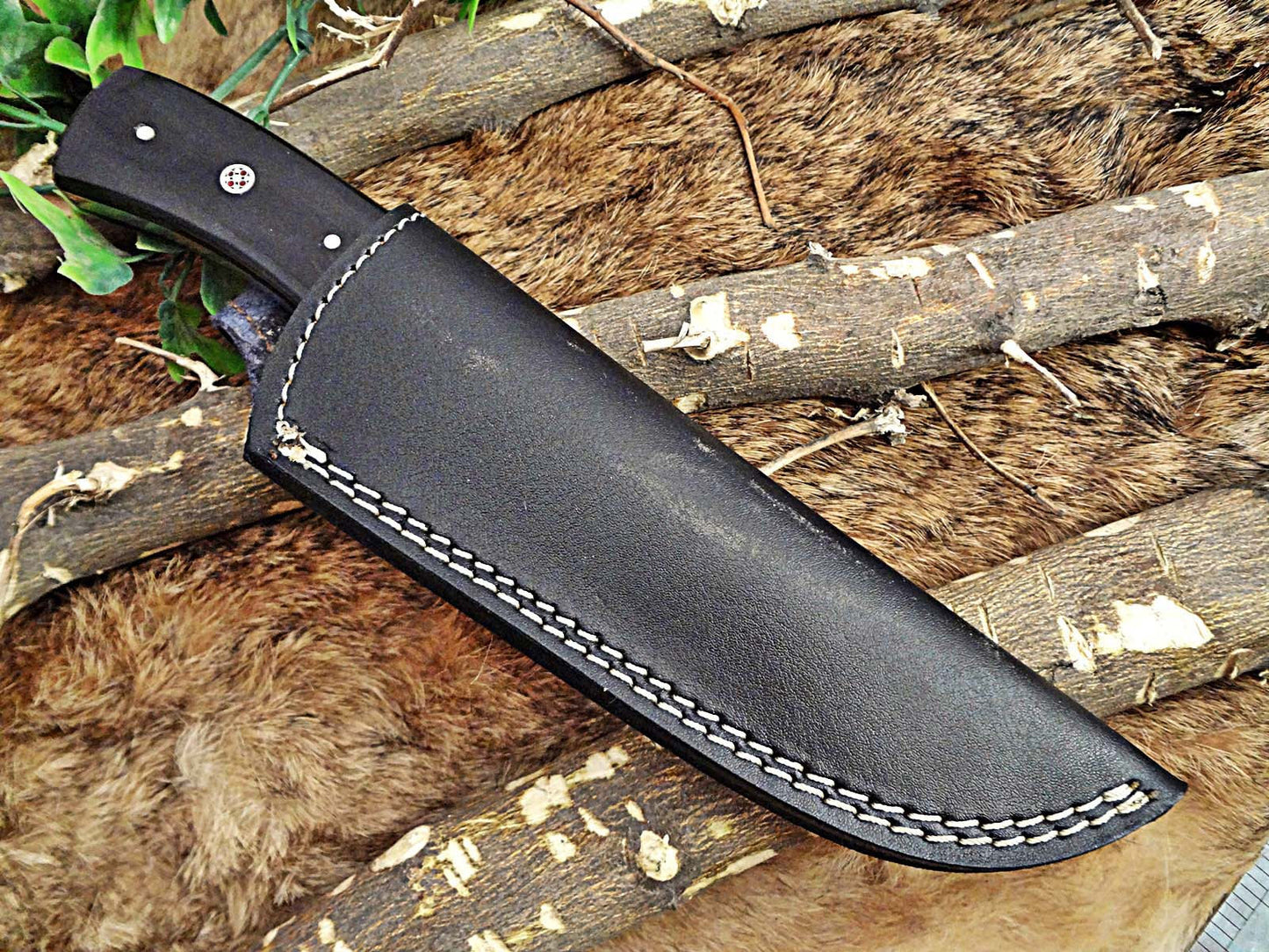 9" Damascus steel full tang Skinning Knife, Black and white scales with Brass Bolster scale, Cow hide Leather sheath included