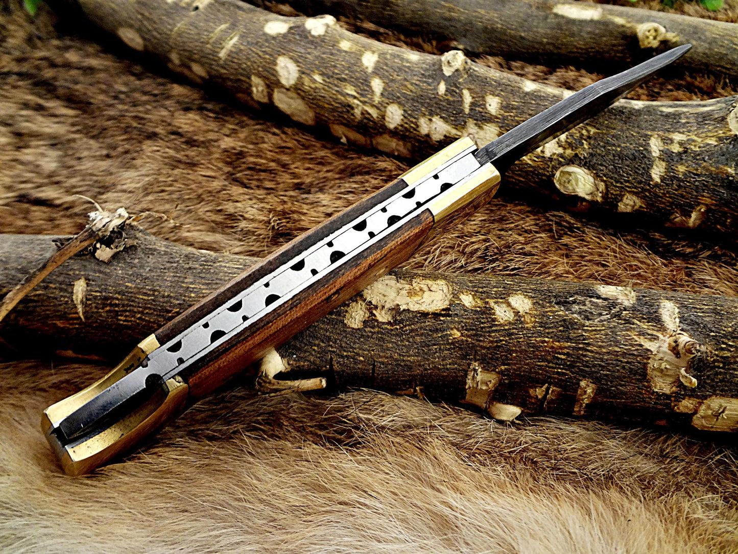 7.5" back liver lock Folding Knife, Hand forged Damascus steel blade, Available in wood, Bone and Horn scales bolster, Comes with cow hide leather sheath