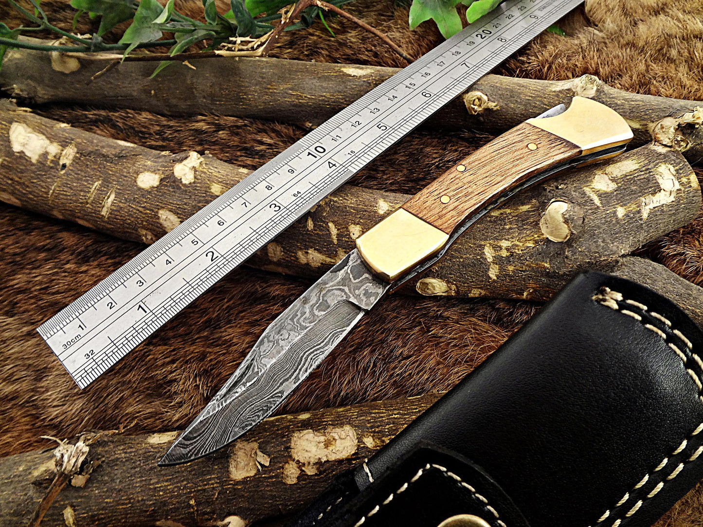 7.5" back liver lock Folding Knife, Hand forged Damascus steel blade, Available in wood, Bone and Horn scales bolster, Comes with cow hide leather sheath