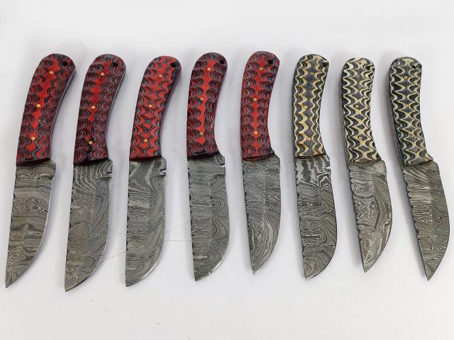 15 pieces Damascus steel Multi color jigged scale skinning knives set with Leather sheath. Over 110 inches long Damascus steel blade knives