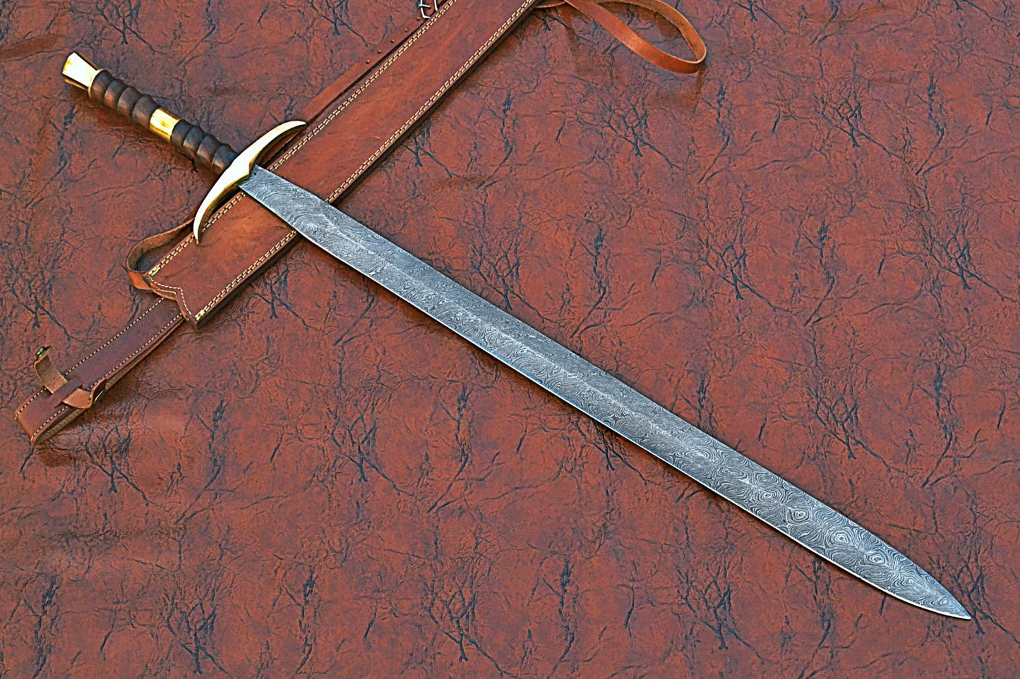 38 inches Long Claymore Sword, 30" Long Hand Forged Damascus Steel Double Edge Blade, Forward Brass Cross hilt Forward and Pommel, Leather Scabbard with Shoulder Stripe
