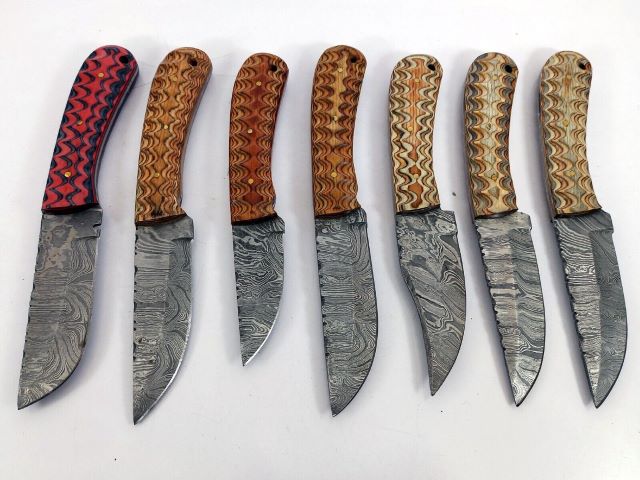 15 pieces Damascus steel Multi color jigged scale skinning knives set with Leather sheath. Over 110 inches long Damascus steel blade knives