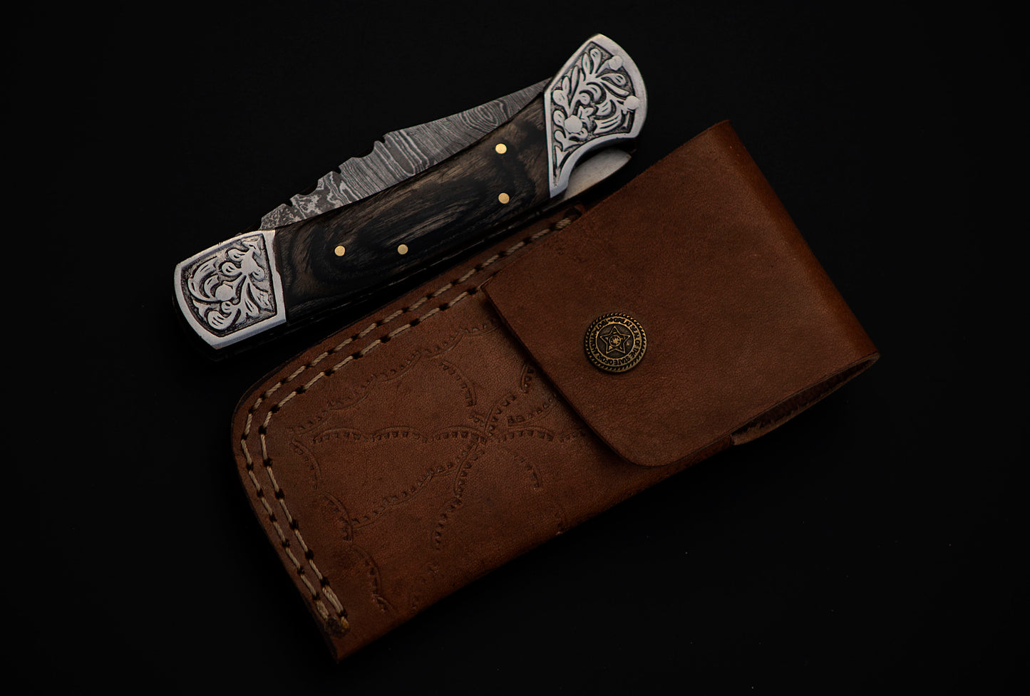 9" long back lock Folding Knife, Black wood Scale with Engraved steel bolster, custom made 4" Hand Forged Damascus steel blade, Cow hide leather sheath with belt loop
