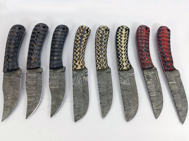 15 pieces Damascus steel Multi color jigged scale skinning knives set with Leather sheath. Over 110 inches long Damascus steel blade knives