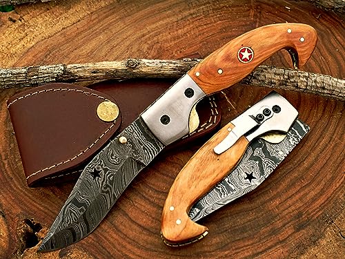 7.5" long hand forged custom made Damascus steel pocket clip folding knife, Star wire cut twist pattern blade, Natural Kow wood scale with star embelem and stainless steel bolster, cow leather sheath included