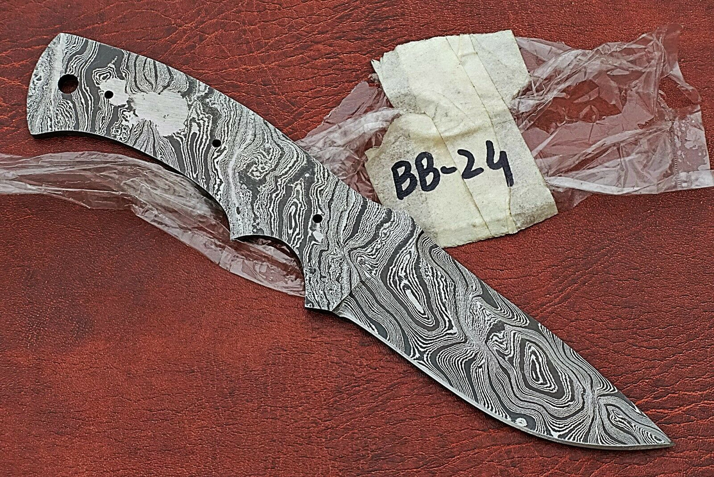 8.5" long Damascus steel drop point blank blade, 4" cutting edge