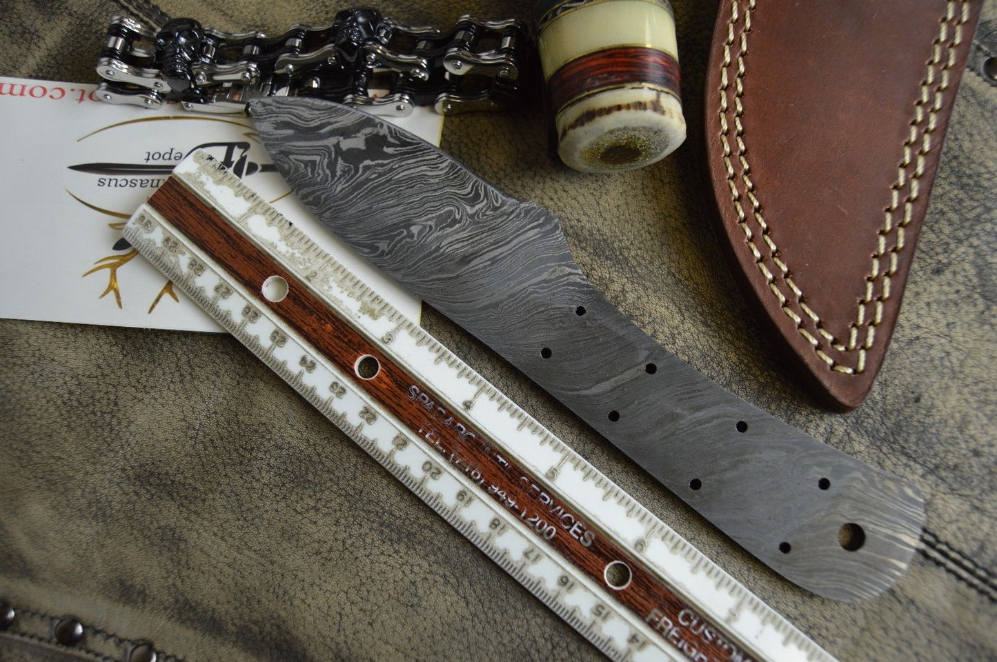 7.5" hand forged Damascus steel blank blade 3.25" cutting edge, 9 scale holes