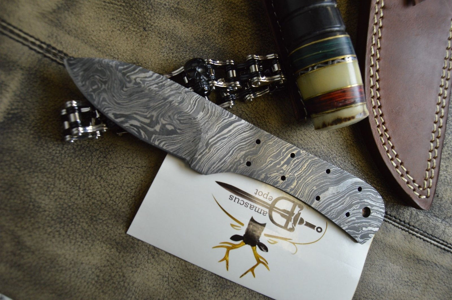 7.5" hand forged Damascus steel blank blade 3.25" cutting edge, 9 scale holes