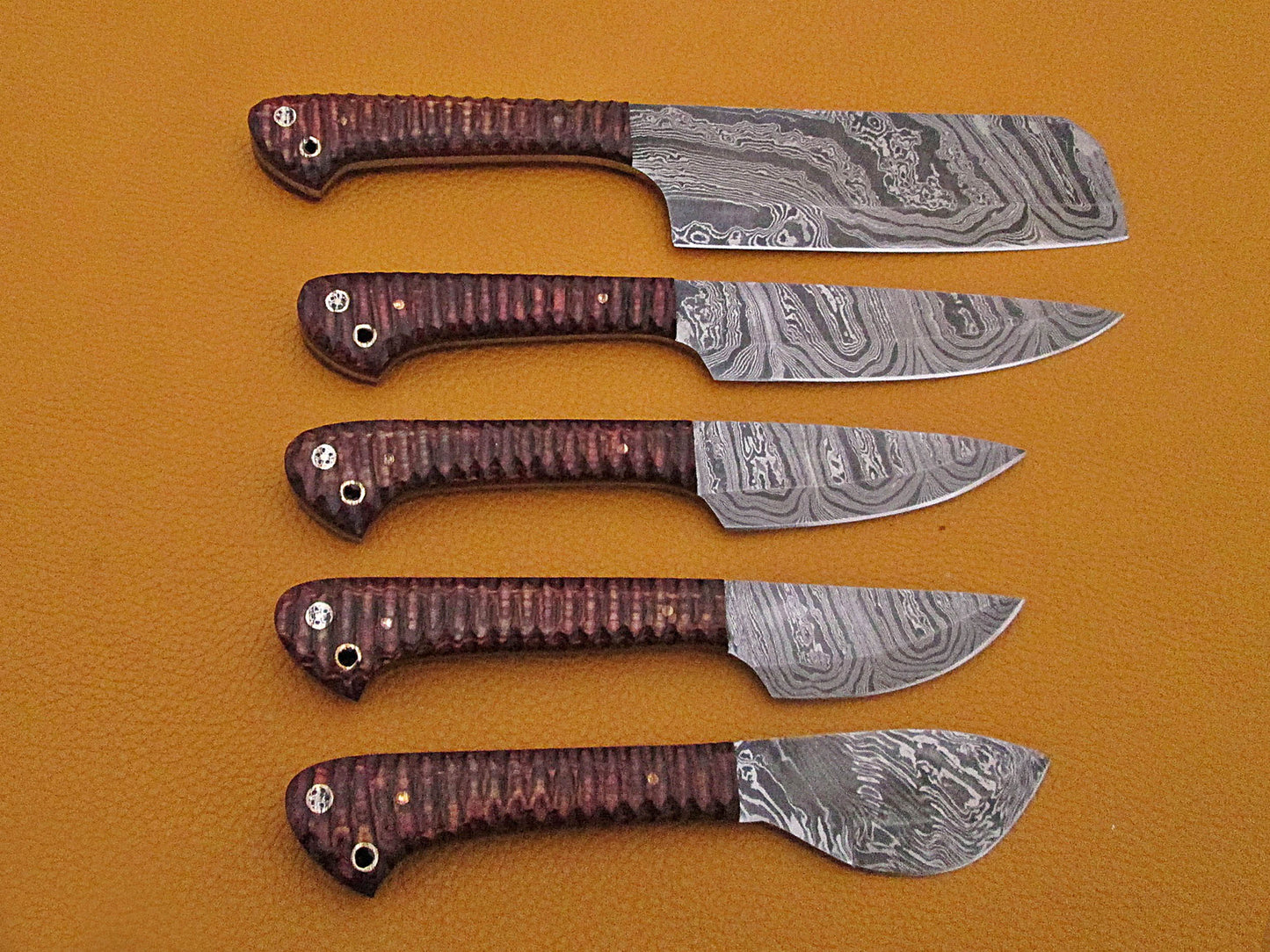 5 Pieces Damascus steel kitchen knife set includes (10.6+9.6+9.0+8.0+7.6)" knives in Brown Jigged wood scale, includes Roll able Leather suede sheath