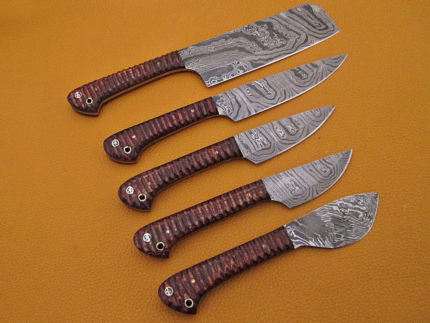 5 Pieces Damascus steel kitchen knife set includes (10.6+9.6+9.0+8.0+7.6)" knives in Brown Jigged wood scale, includes Roll able Leather suede sheath