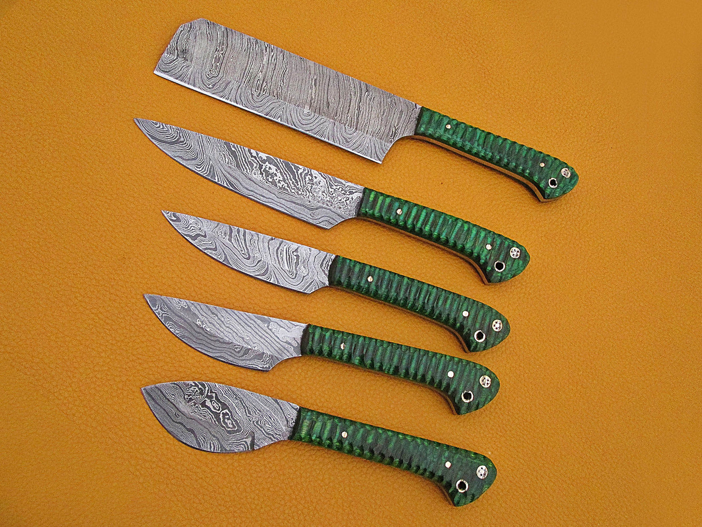 5 Pieces Damascus steel kitchen knife set includes (10.6+9.6+9.0+8.0+7.6)" knives in Green Jigged wood scale, includes Roll able Leather suede sheath