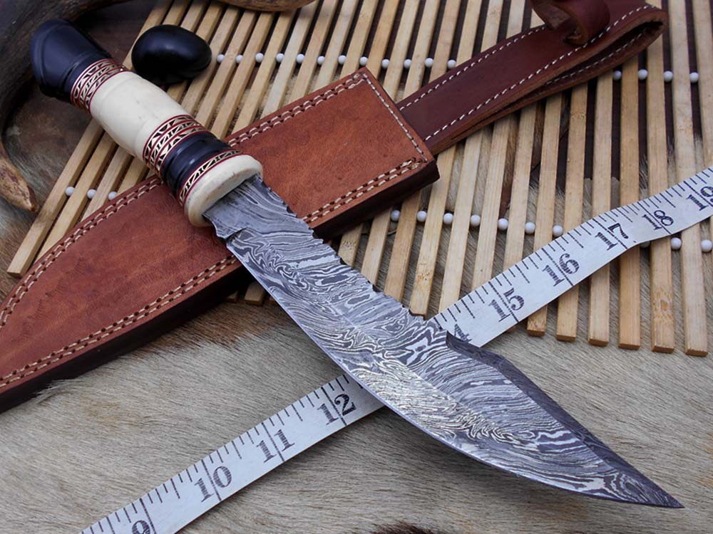 13.5 Inches long Hand Forged Damascus hunting Bowie Knife 8" blade. Camel bone, engraved brass & horn exotic scale cow hide leather sheath