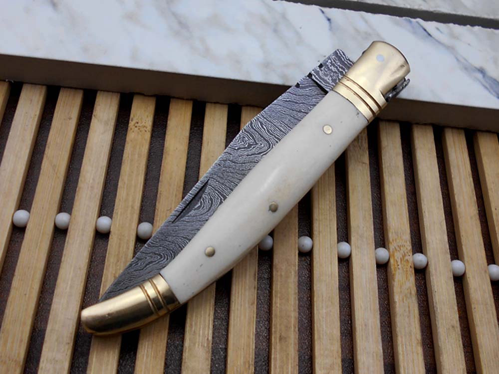 8.5" Damascus steel Laguiolle knife, Available in various scales with brass bolster, 4" twist pattern Blade,  Cow hide leather sheath included