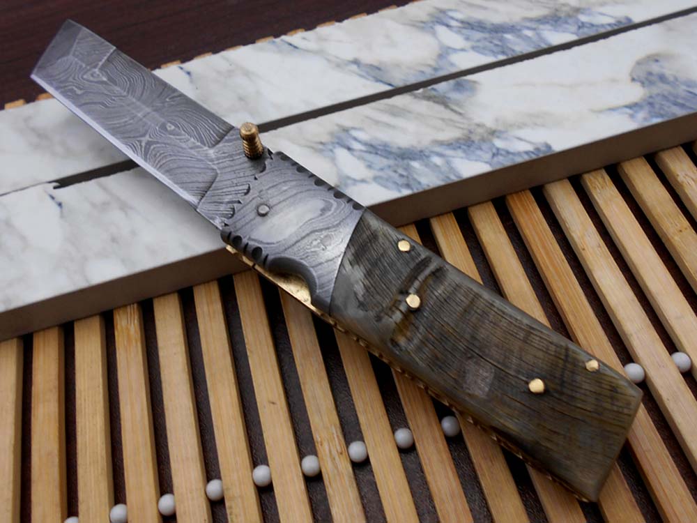Damascus steel folding knife 7.5" long hand forged custom made 3.5" Tanto blade, Ram horn scale with Damascus bolster, Cow leather sheath