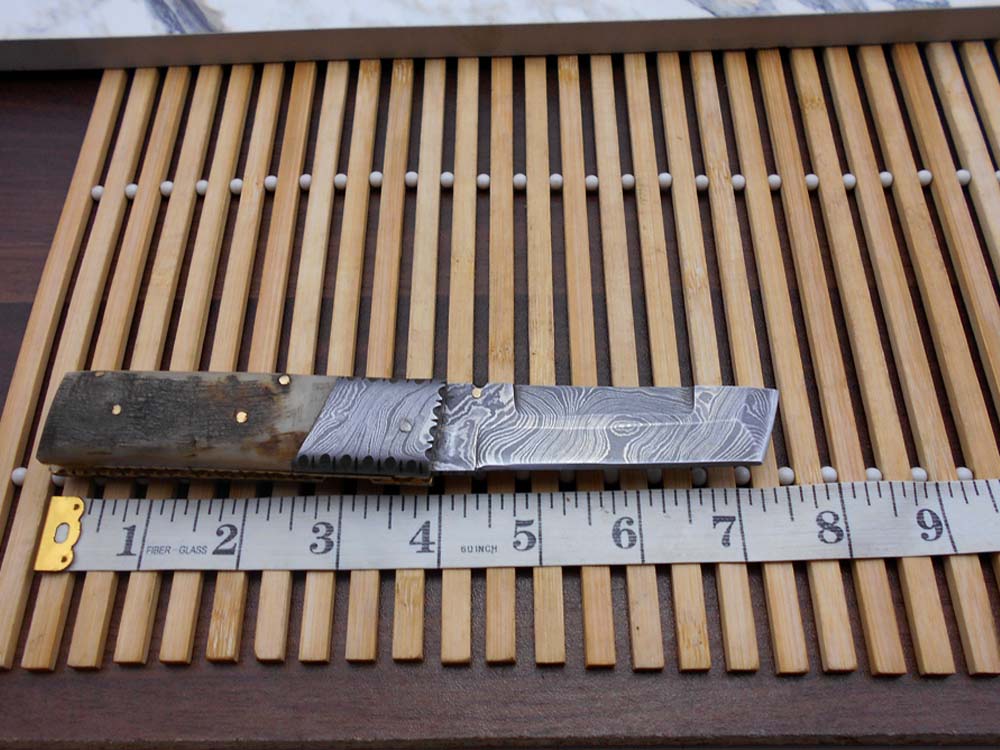Damascus steel folding knife 7.5" long hand forged custom made 3.5" Tanto blade, Ram horn scale with Damascus bolster, Cow leather sheath