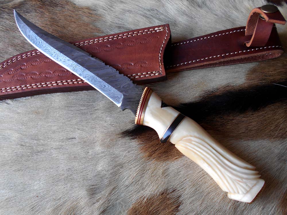 13 " long Damascus steel skinning knife, exotic hand carved Camel bone scale crafted with engraved brass, spacer and sliced bull horn, Cow hide leather sheath included.