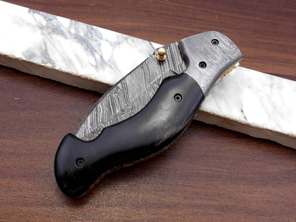 7.5" Folding Knife, 3.5" Legal Hand Forged Twist Pattern Damascus Steel Blade, Black and White Scales Available, Pocket Knife, Liner Lock & Thumb knob Equipped, Cow Hide Leather Sheath