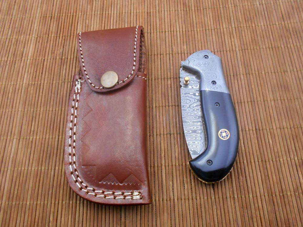 Hand forged twist pattern Damascus steel 7.5" folding knife, Available in 3 scales options with Bolster, Pocket knife Equipped with Brass liner lock & thumb knob, Cow Hide Leather sheath