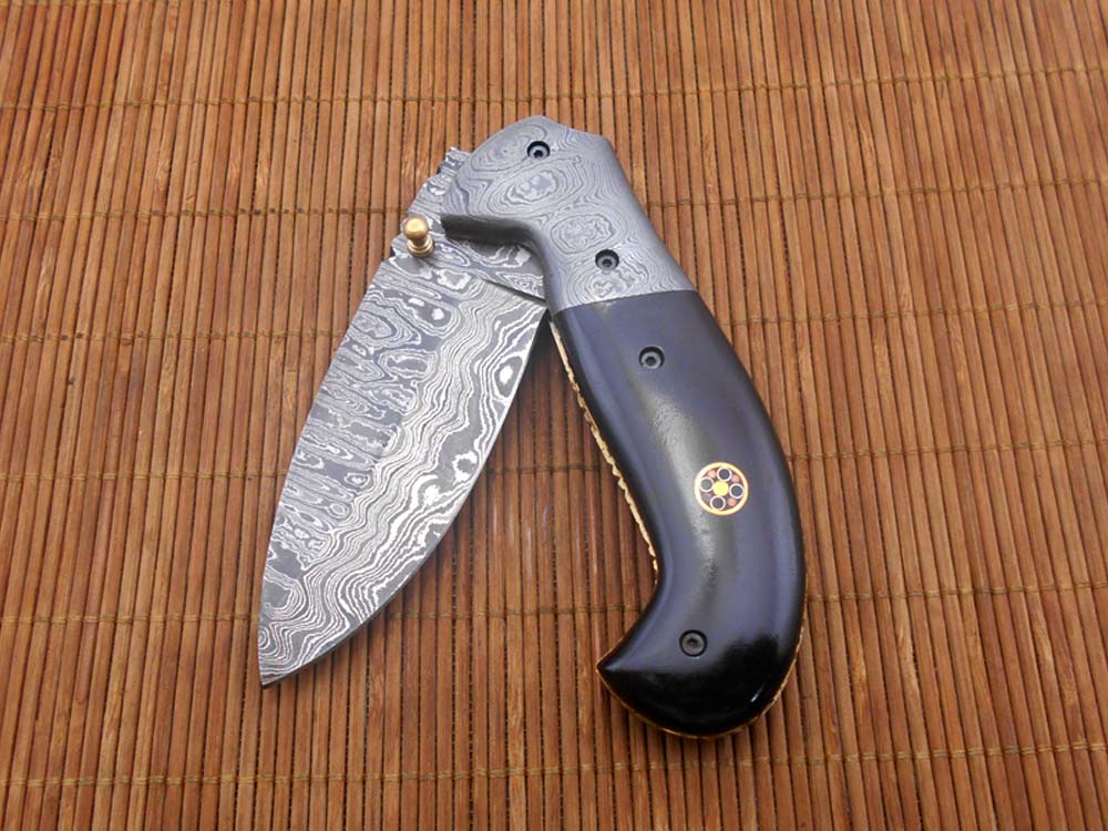 Hand forged twist pattern Damascus steel 7.5" folding knife, Available in 3 scales options with Bolster, Pocket knife Equipped with Brass liner lock & thumb knob, Cow Hide Leather sheath