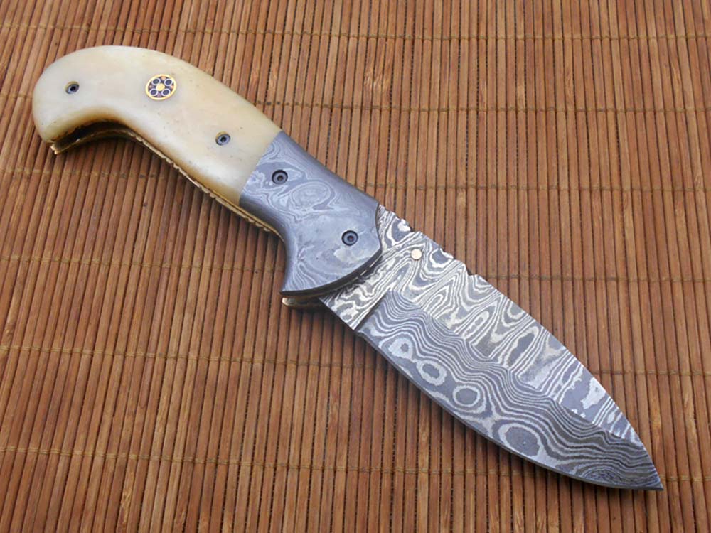 Hand forged twist pattern Damascus steel 7.5" folding knife, Available in 3 scales options with Bolster, Pocket knife Equipped with Brass liner lock & thumb knob, Cow Hide Leather sheath