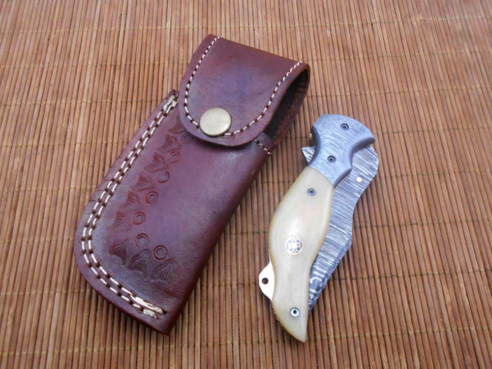 7.5" folding Damascus steel knife, liner lock, thumb knob, Cow Leather sheath