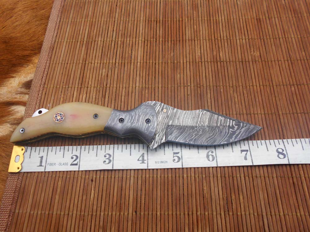 7.5" folding Damascus steel knife, liner lock, thumb knob, Cow Leather sheath