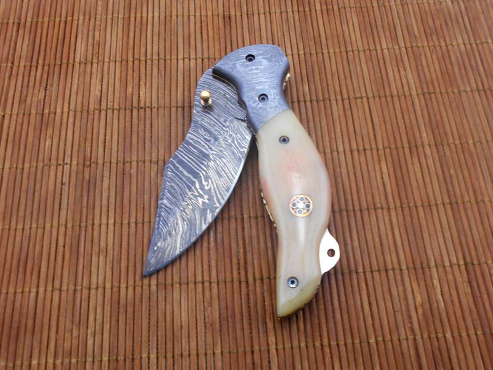 7.5" folding Damascus steel knife, liner lock, thumb knob, Cow Leather sheath