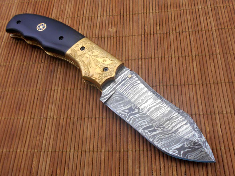 8" Damascus steel folding pocket knife with plant Engraved on brass bolster, White & black colors scale, included leather sheath