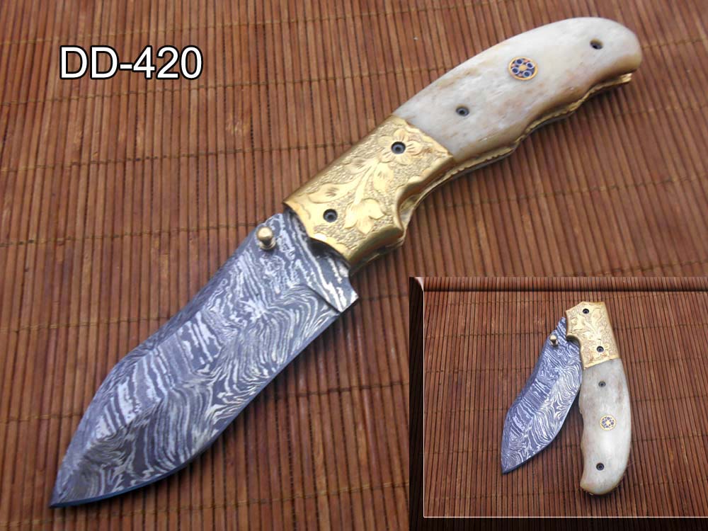 8" Damascus steel folding pocket knife with plant Engraved on brass bolster, White & black colors scale, included leather sheath