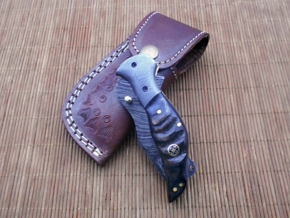 7.5" folding Damascus steel knife, liner lock, thumb knob, Cow Leather sheath