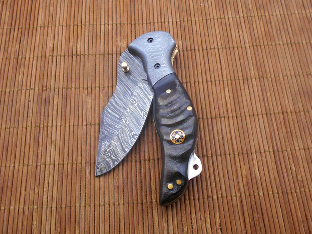 7.5" folding Damascus steel knife, liner lock, thumb knob, Cow Leather sheath