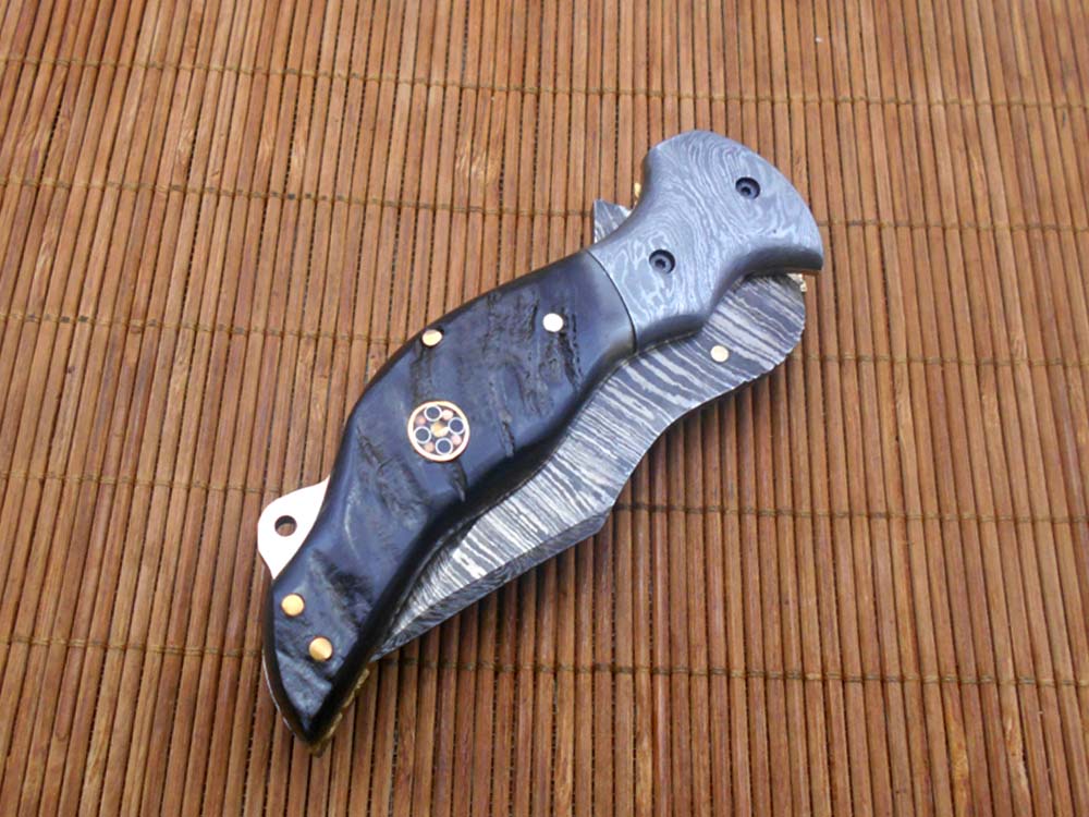 7.5" folding Damascus steel knife, liner lock, thumb knob, Cow Leather sheath