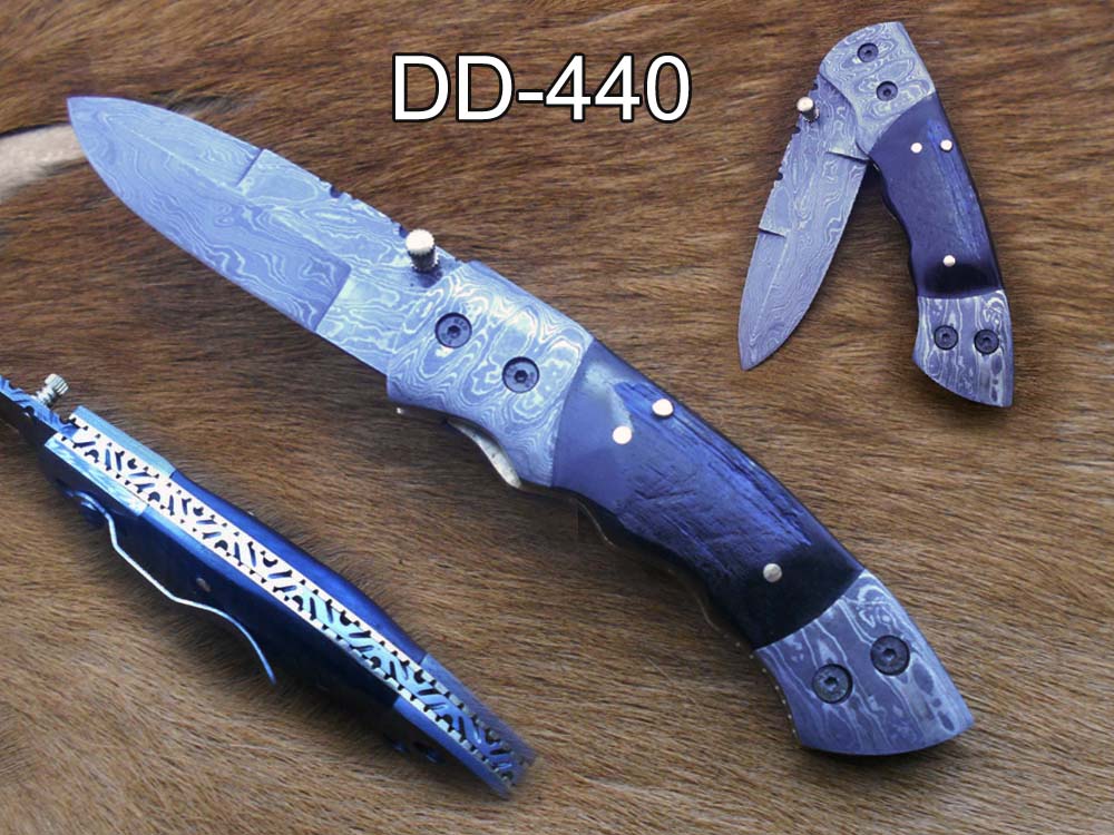 7.5" Damascus folding knife with Damascus bolster on both edges with thumb knob & liner lock equipped, Available in 4 scales, Cow hide leather sheath with belt loop included