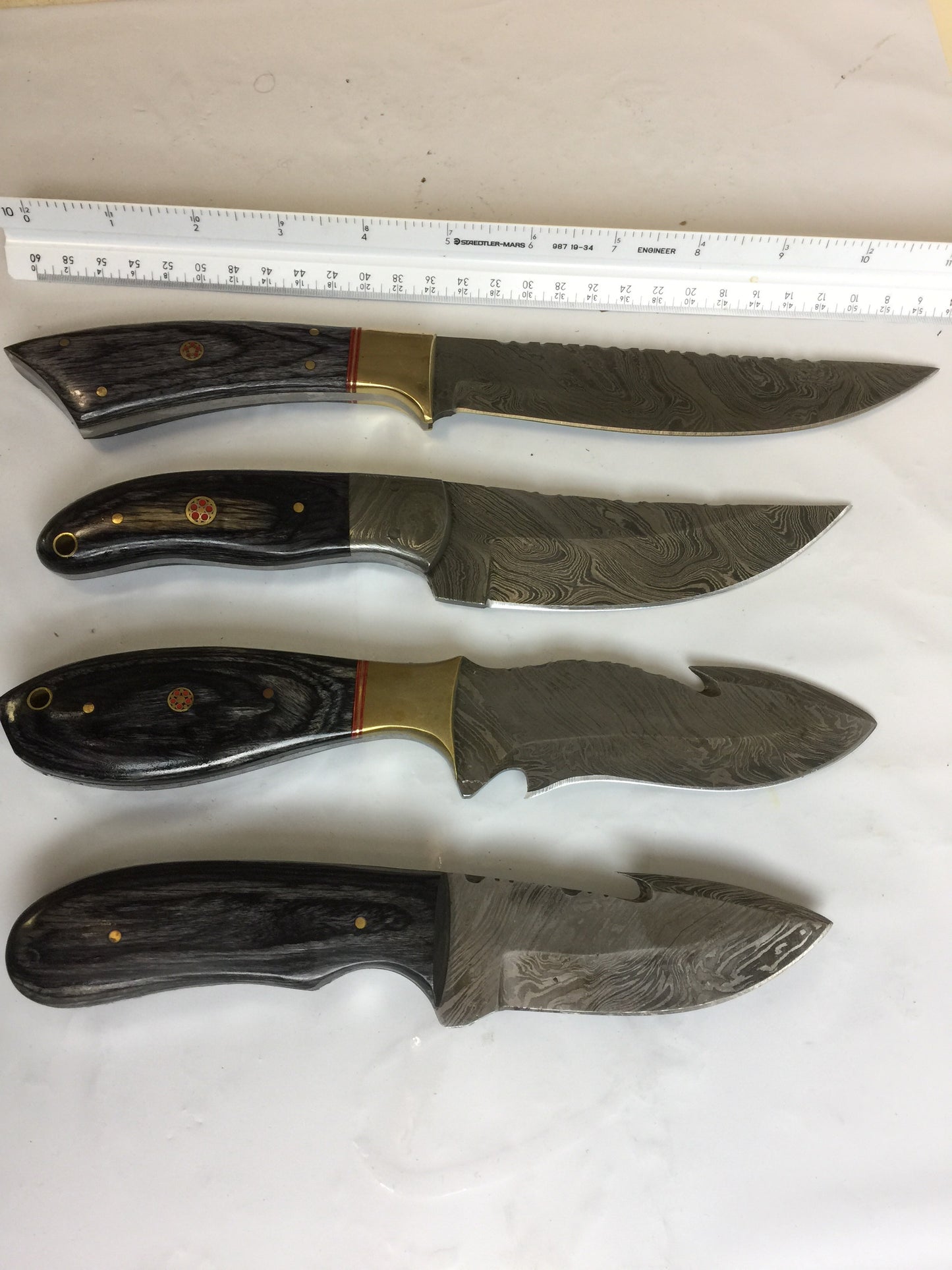 4 pieces Damascus steel Dollar wood scale skinning knives set. Overall 40 inches long Full tang Damascus steel blade knives, Cow hide leather sheath