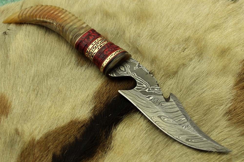 13" Long hand forged Damascus steel gut hook Skinning Knife, Custom made Round engraved jigged scale Crafted with engraved Brass spacer, Cow hide Leather sheath