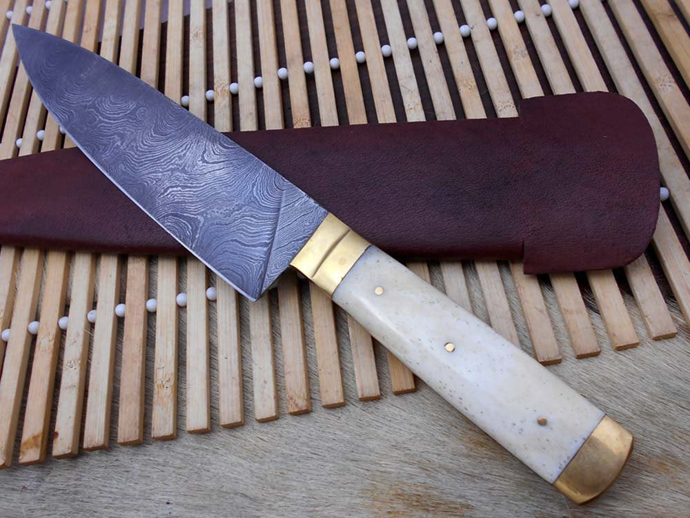 Damascus Steel kitchen Knife 11.4 Inches full tang 7" long Hand Forged blade, Camel bone and brass boldter scale, cow hide leather sheath