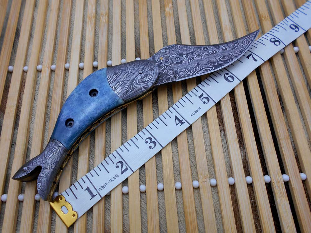 Fish shape 8" folding pocket knife available in 3 natural scales,  Cow leather sheath included