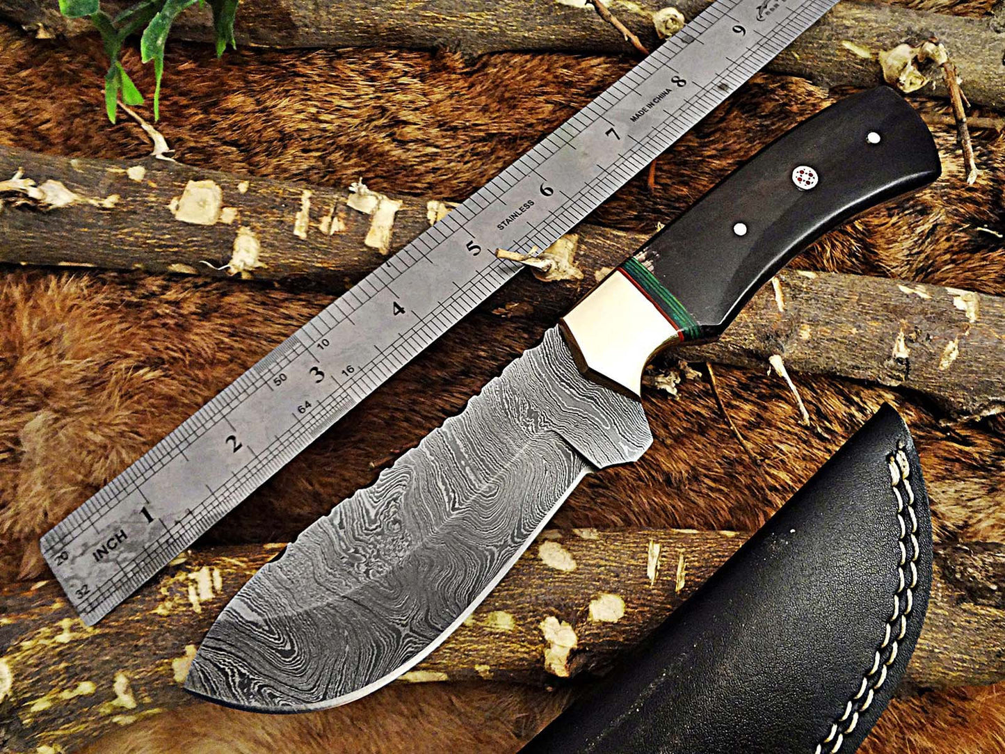9" Damascus steel full tang Skinning Knife, Black and white scales with Brass Bolster scale, Cow hide Leather sheath included