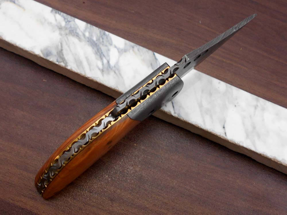 7" long Hand Forged Damascus steel blade Folding Knife, 1 hand opening , Rose wood & Damascus bolster scale, cow hide leather sheath