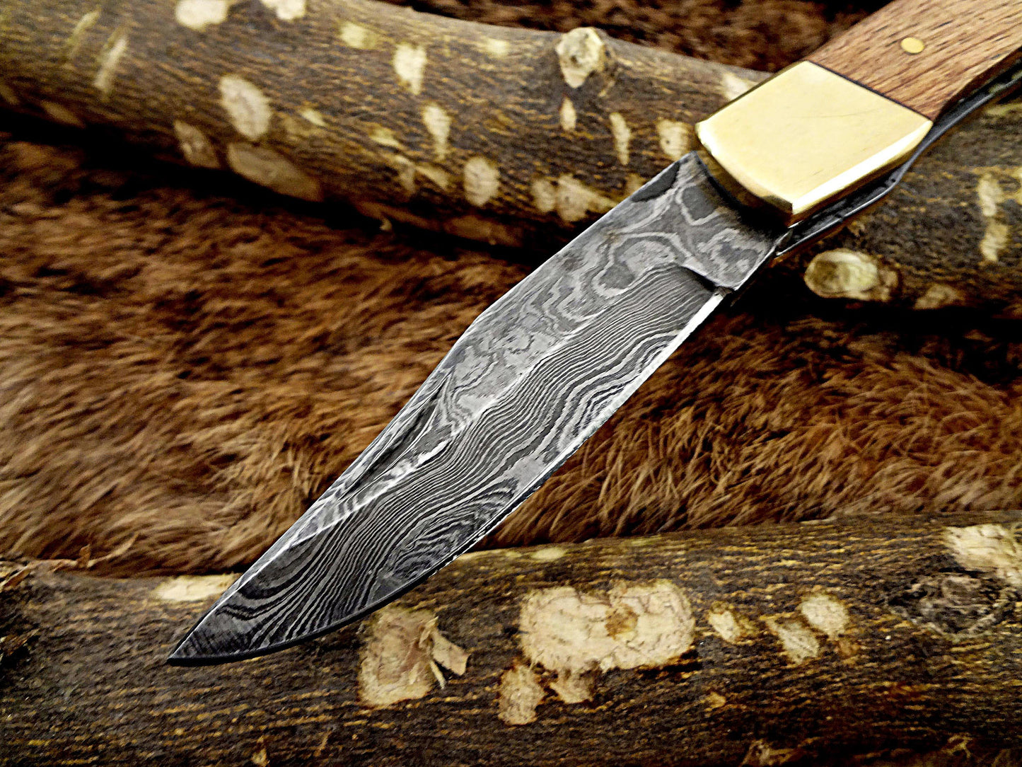 7.5" back liver lock Folding Knife, Hand forged Damascus steel blade, Available in wood, Bone and Horn scales bolster, Comes with cow hide leather sheath